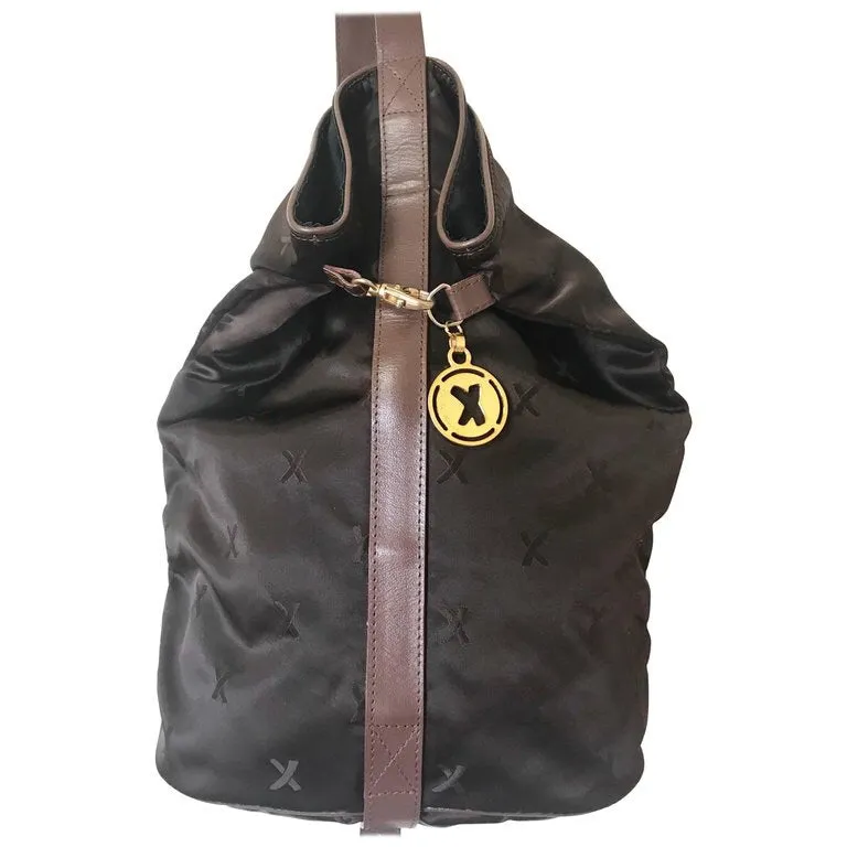 Vintage Paloma Picasso brown satin logo jacquard hobo shoulder bag with leather trimmings and golden logo charm. Classic bag for daily use.