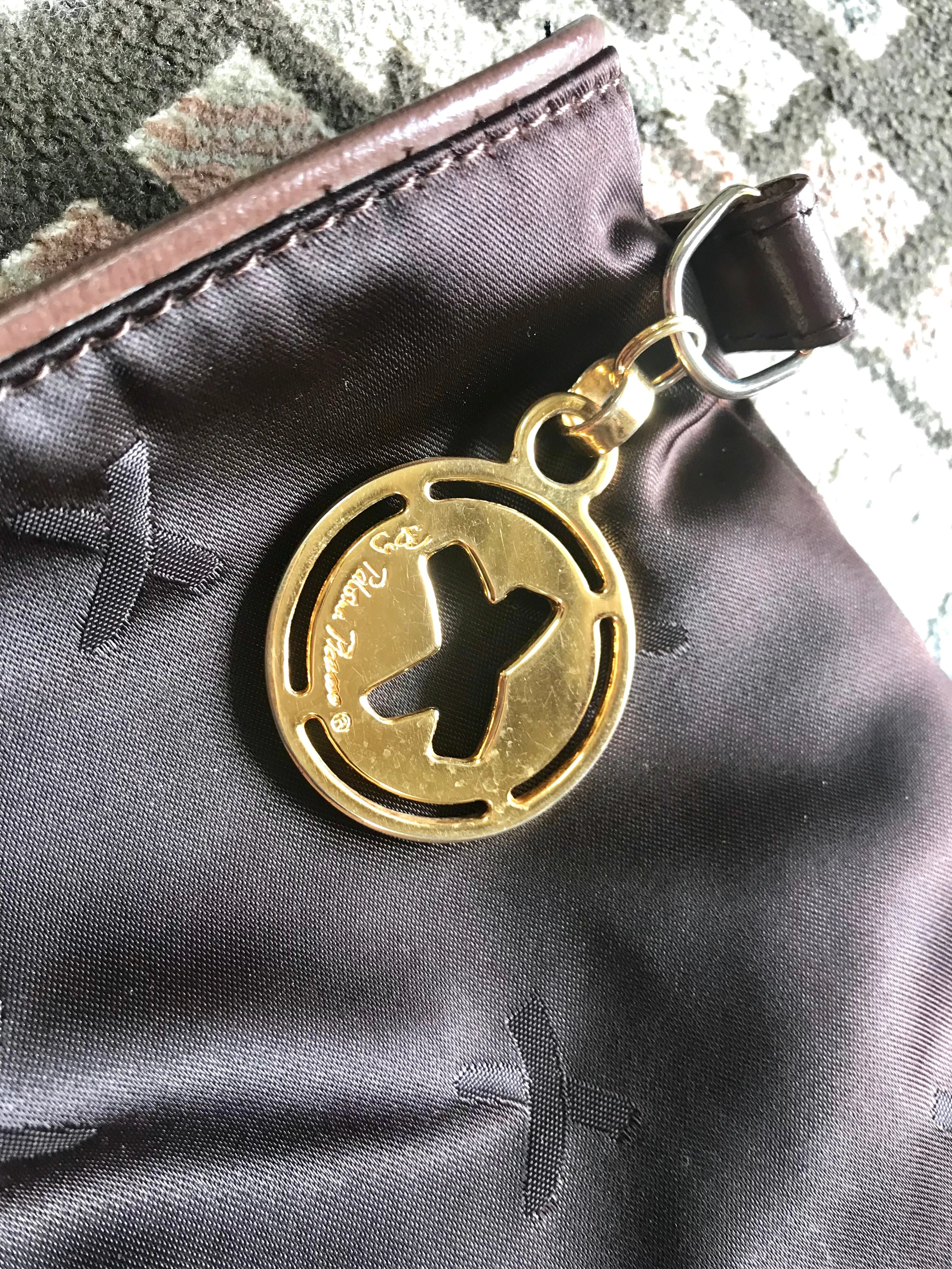 Vintage Paloma Picasso brown satin logo jacquard hobo shoulder bag with leather trimmings and golden logo charm. Classic bag for daily use.