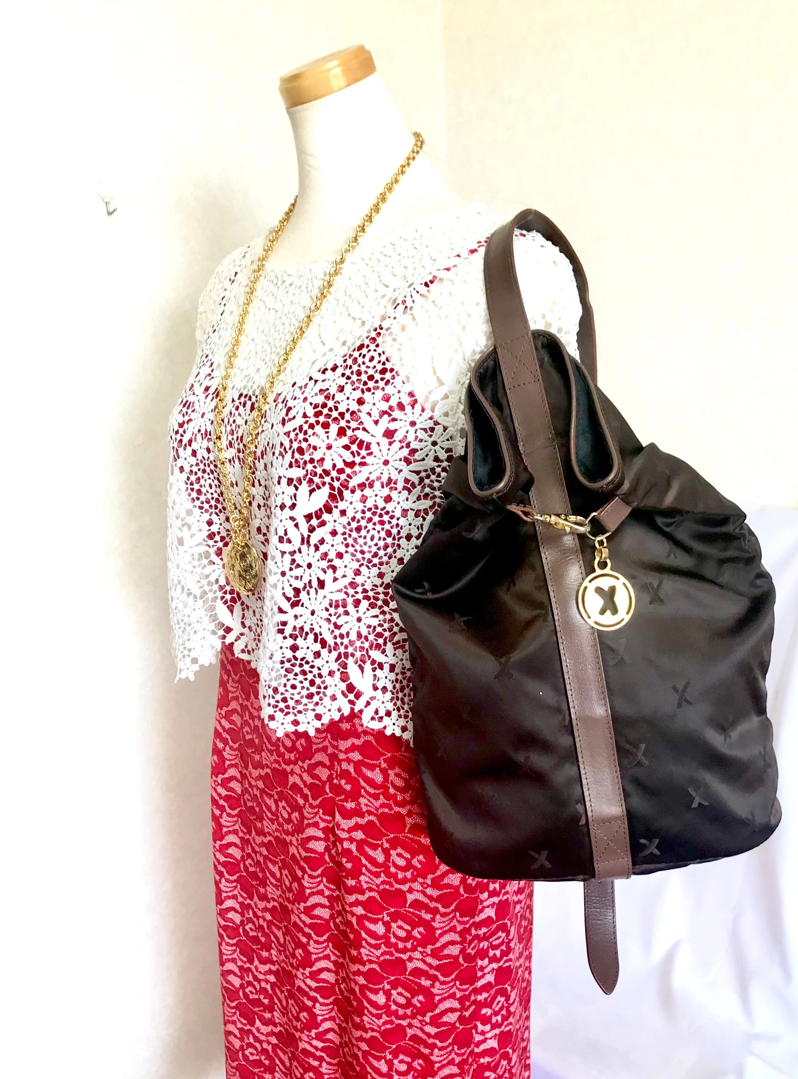 Vintage Paloma Picasso brown satin logo jacquard hobo shoulder bag with leather trimmings and golden logo charm. Classic bag for daily use.