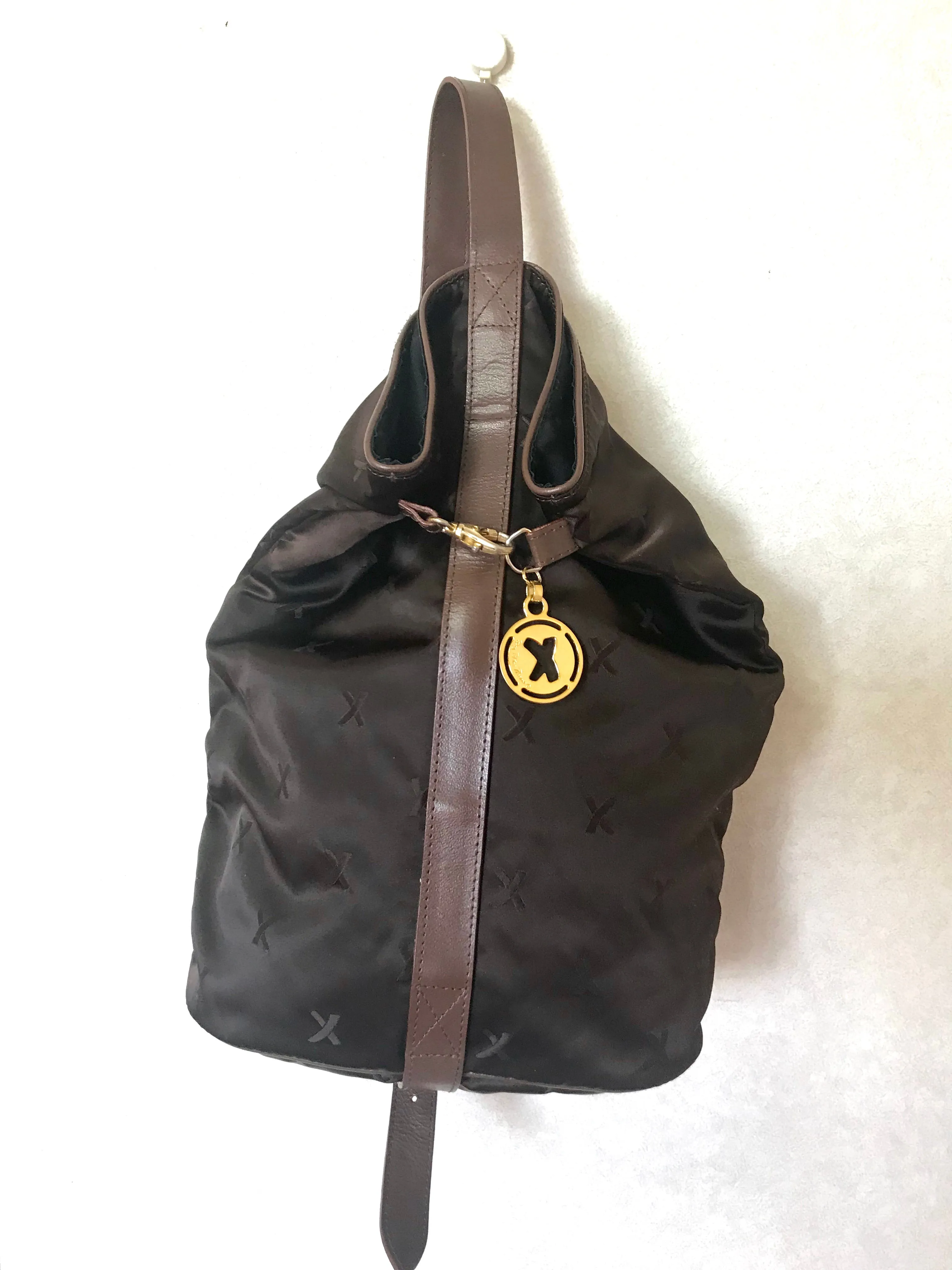 Vintage Paloma Picasso brown satin logo jacquard hobo shoulder bag with leather trimmings and golden logo charm. Classic bag for daily use.